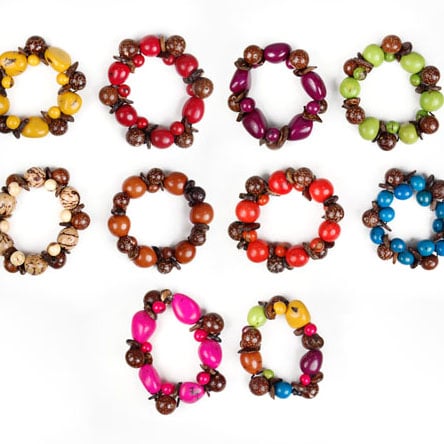 A picture of the different colors that the jungle hair tie can come in, those colors are, yellow, red, purple, lime, light brown, brown, orange, turquoise, pink, and multi.