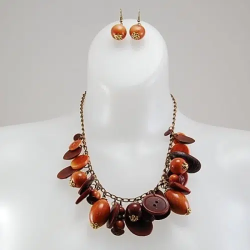 A picture of the crafters set, made from tagua buttons, discs, and beads, with bronze tone detail.