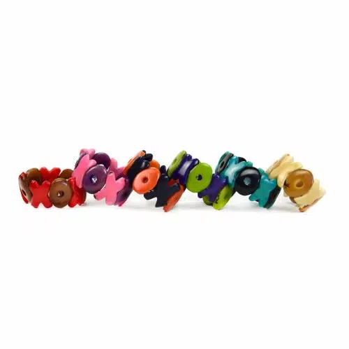 The tagua xo bracelet, made from carved tagua in the shapes of x's and o's, comes in a verity of colors, those colors are red/brown purple/pink orange/black green/purple black/turquoise, and white/ brown