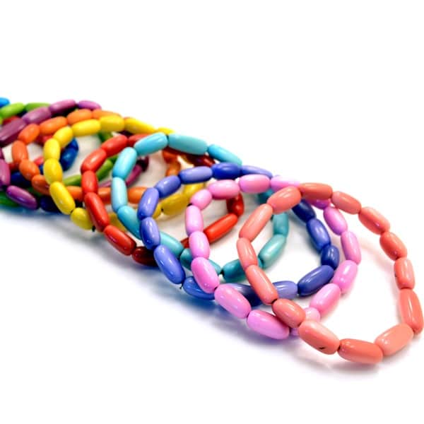 The arroz bracelet comes in super bright colors and is made from tagua beads.