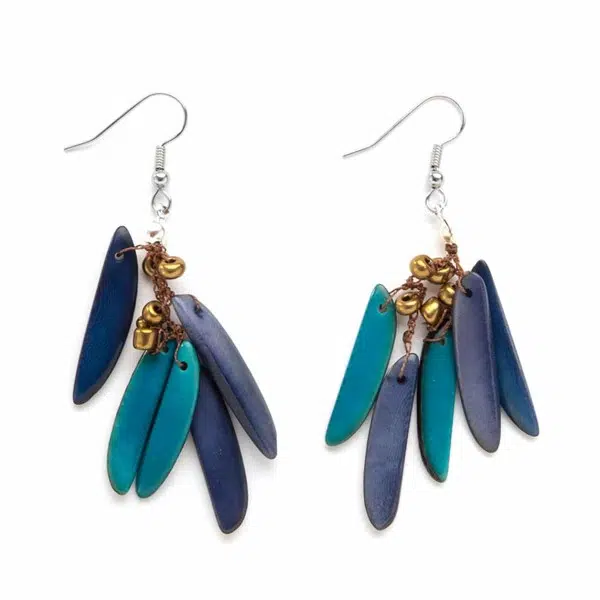 A close up picture of the feather earrings, coming in the color blue.
