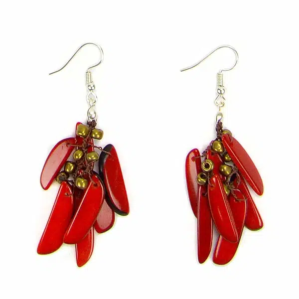 A close up picture of the feather earrings, coming in the color red.