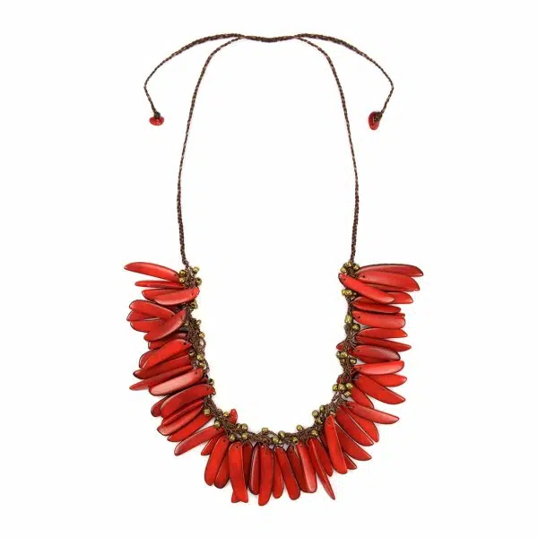 A close up picture of the red feathers necklace.