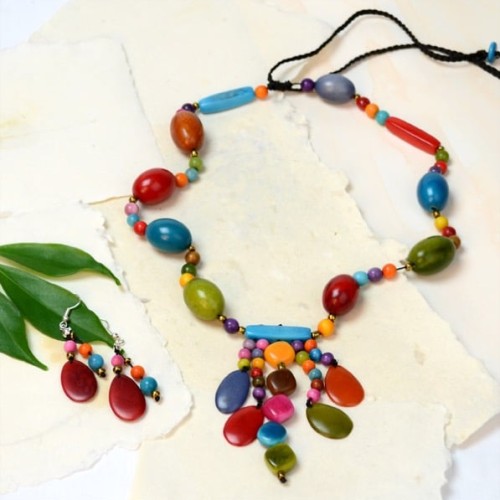 A picture of a bright colored tagua pieces, to make a fun necklace called carnivale set.