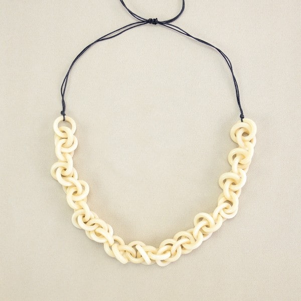 A picture of the white helix necklace.
