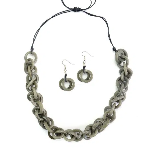 A picture of the grey heliz set made from tagua links in a very chic tagua chain.