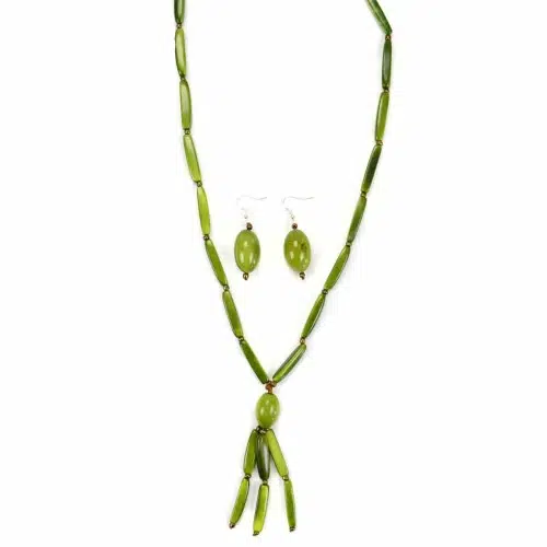 A picture of the runway set, made from long rectangular beads with alternating brass beads, the color of this set is green.