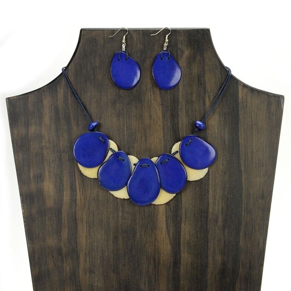 A picture of the nine slice set, made from slices of tagua. Comes in a verity of colors, this picture shows the blue and white set.