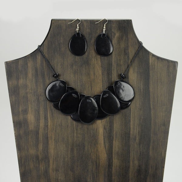 A picture of the nine slice set, made from slices of tagua. Comes in a verity of colors, this picture shows the black set.