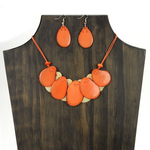 A picture of the nine slice set, made from slices of tagua. Comes in a verity of colors, this picture shows the orange natural set.