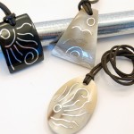 A picture of the aluminum inlay necklace, the necklaces come in a verity of styles.