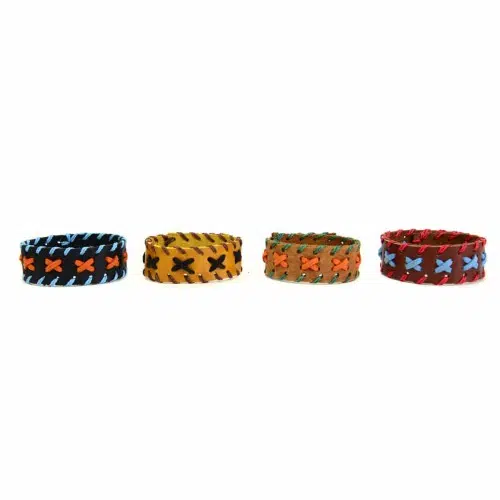 A picture of four different colors for the stud bracelet, those colors are, dark blue, yellow, brown, maroon.