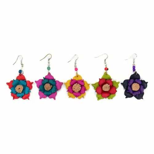 A picture of five different flowers, showing off there bright colors. The colors in this picture are, red, purple, yellow, green, and black.