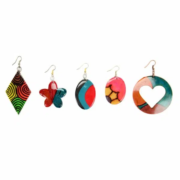 A colorful assortment of gourd earrings, they have a verity of designs and shapes available, the shapes in this picture are, A Dimond, star, oval, smaller oval, and a circle with a heart in it.