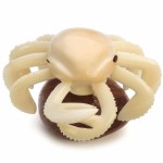 A hand carved crab, with attention to detail, this crab has been craved from a tagua seed.