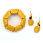 A picture of the yellow chunky bracelet and earring.