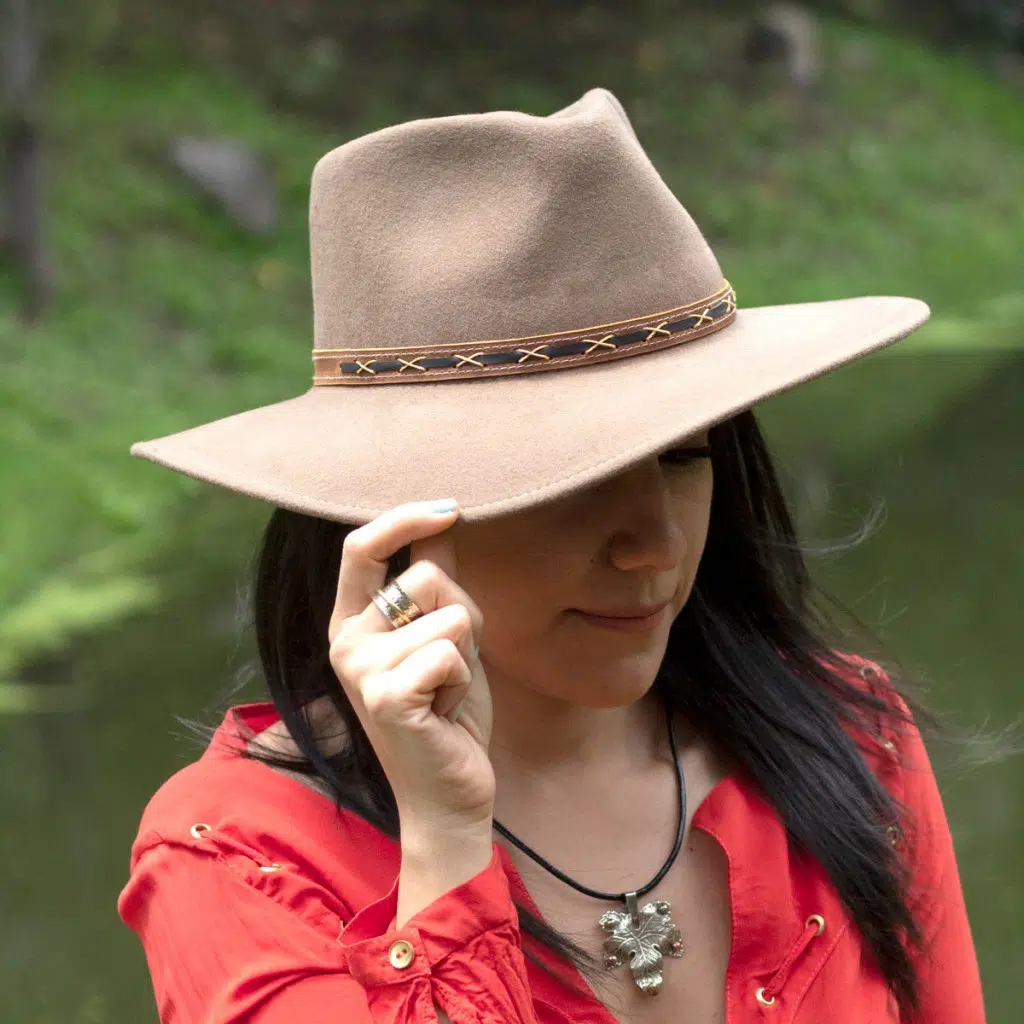 A young female wearing the wool aussie hat