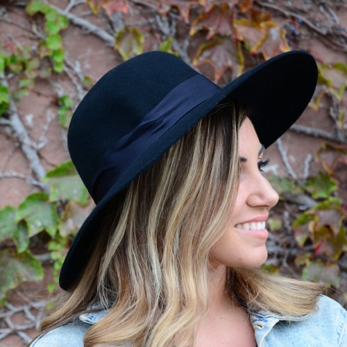 Young women wearing the wool zoe hat