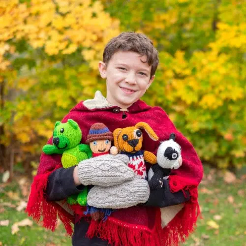 Boy carrying assorted Dandy Pal