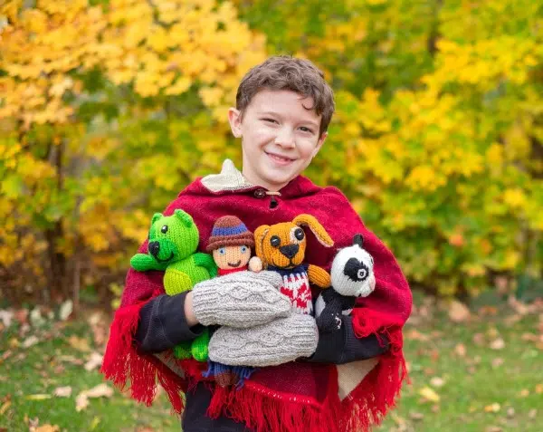 Boy carrying assorted Dandy Pal