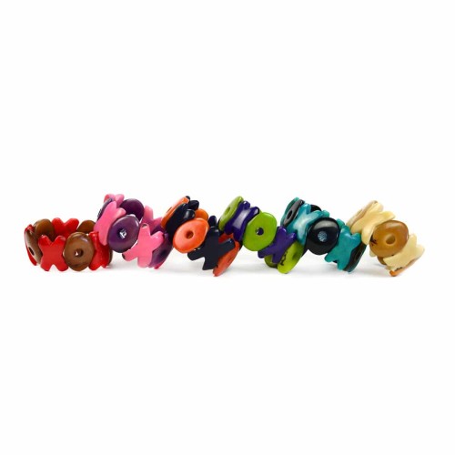 A picture of six different tagua XO bracelets, comes in a verity of colors, those colors are, red/brown, pink/purple, black/orange, green/purple, black/turquoise, white/brown.