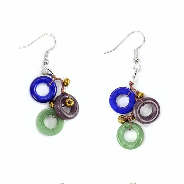 A set of the melody earrings, there rings are blue, purple, and green.
