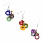 A picture of three melody earrings, showing the bright colorful carved tagua rings.