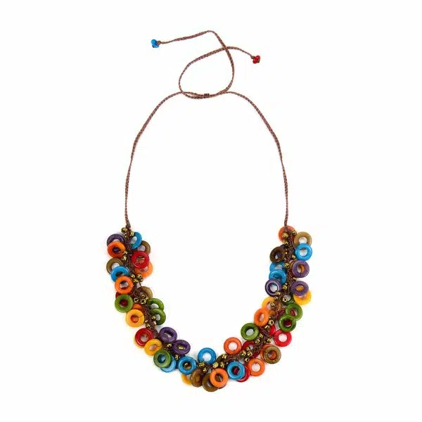 A close up picture of a multi colored beads on a necklace.