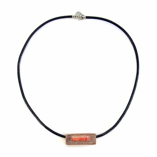 A picture of a stone bar necklace, A semi precious stone in a shell made out of metal.