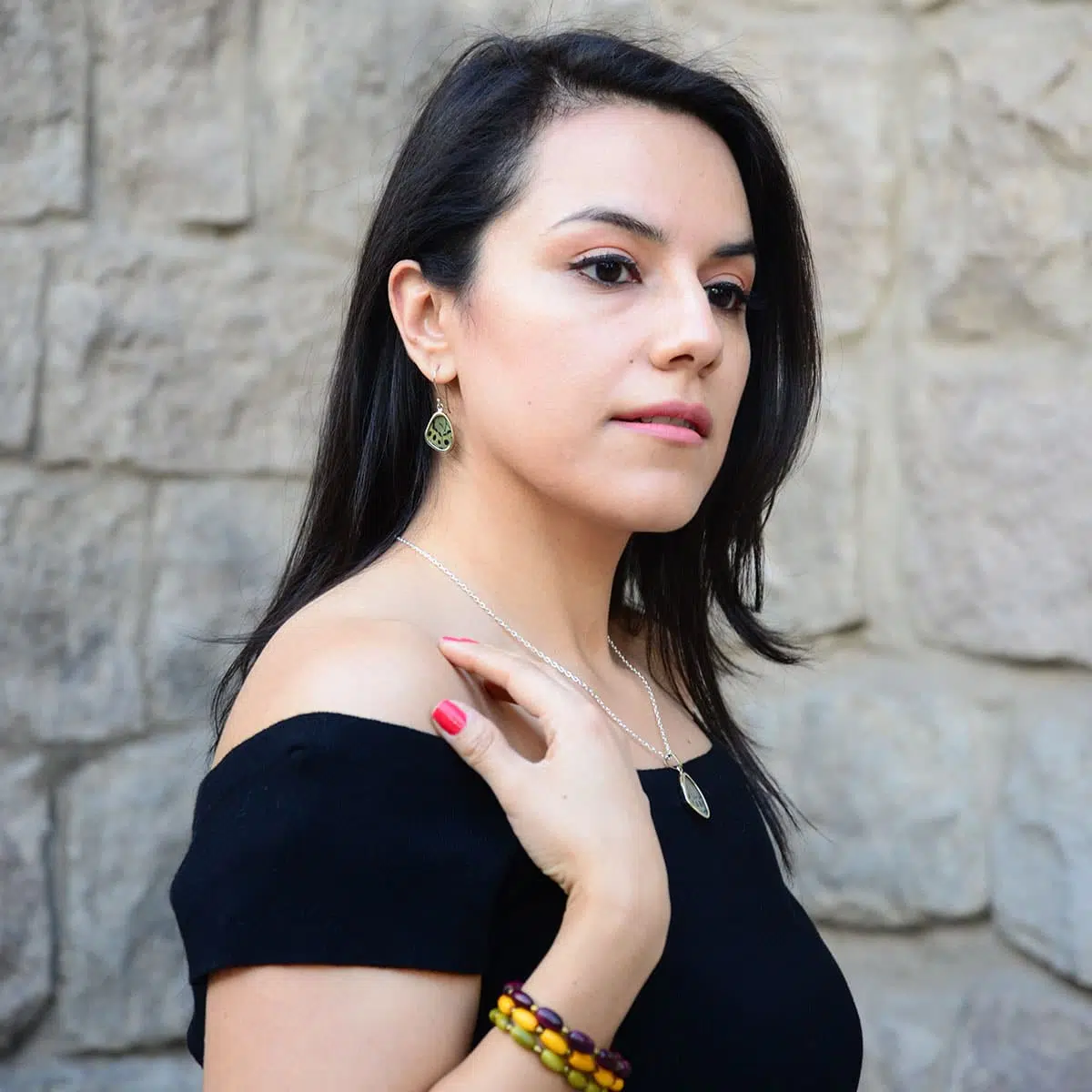 A picture of a young women wearing the butterfly set.