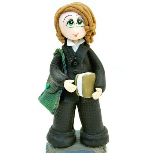 A clay based figurine of a young women thinking about something