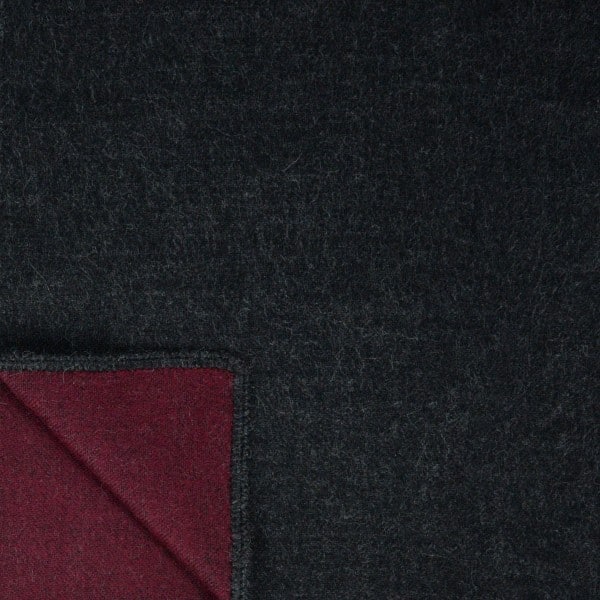 A close up of the cara capelet, comes in different colors, and this color is dark red