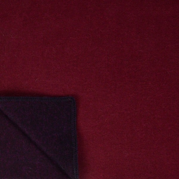 A close up of the cara capelet, comes in different colors, and this color is red