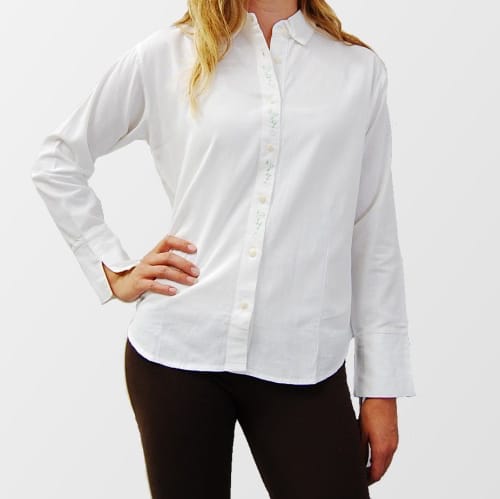 A button down blouse with hand embroidered designs