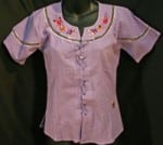 A dark purple short sleeved blouse, with hand embroidered accents