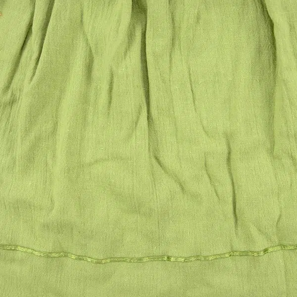 The mandy blouse in different colors, this one is green