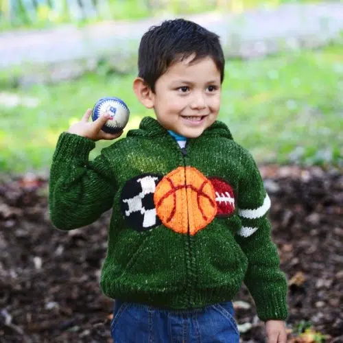 A young kid wearing the sport sweater, has ribbed cuffs and waist