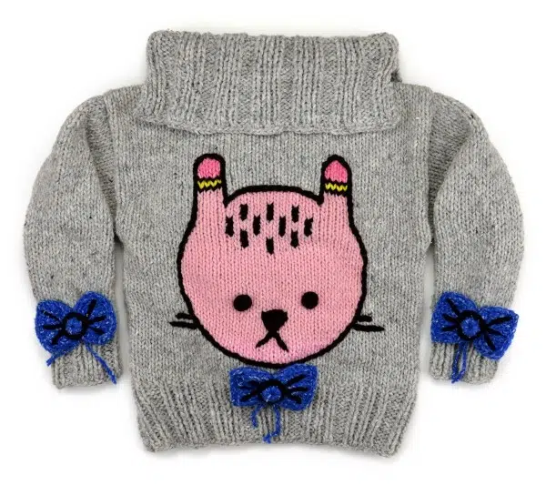 A dandy pal bunny sweater, has bows on the arms and in the middle