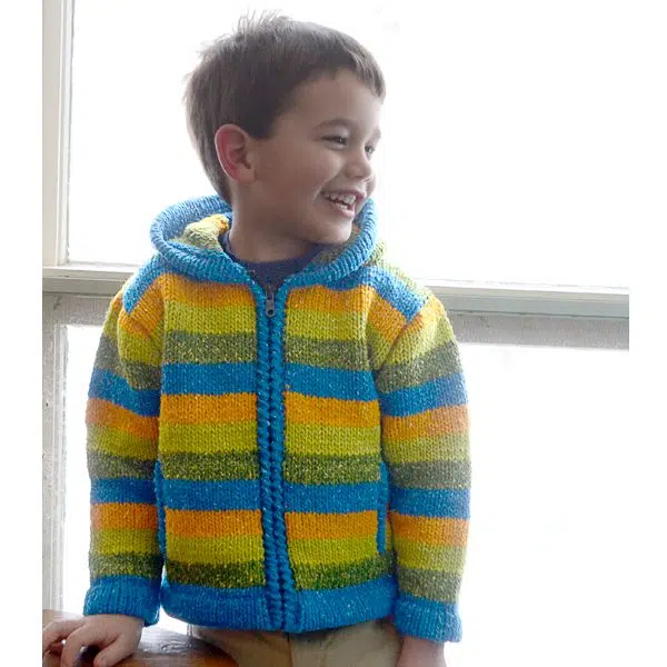 A kid wearing the striped sweater
