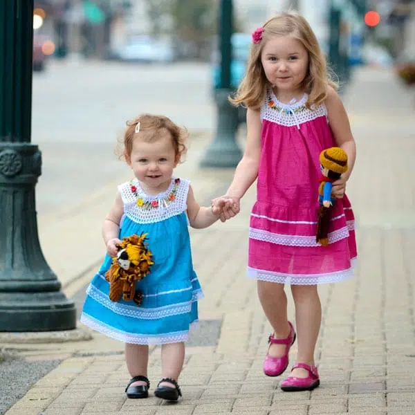 Littles girls wearing a light blue and a pink Gauze Dress