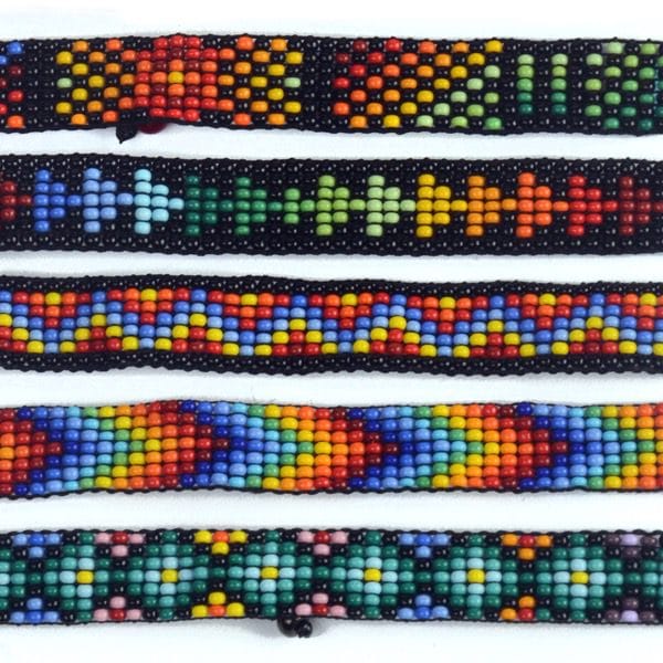 A picture of five different woven bead choker, comes in a verity of colors and designs.