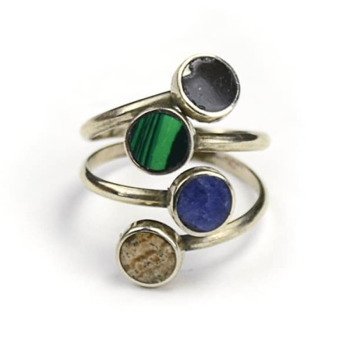 A close up picture of the quartet ring, Four semi precious stones attached on some alpaca silver.