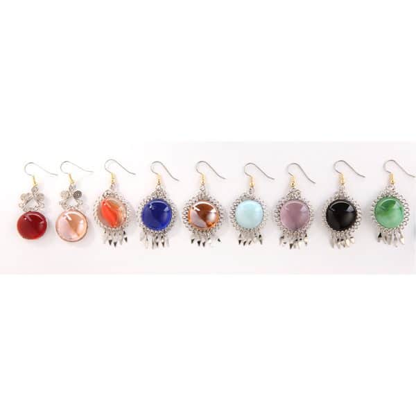 A picture of all the different colors that the gem earrings can come in, the colors are, red, peach, clear/pink, clear/orange, blue, clear/brown, bright blue, dark pink, black, and green.