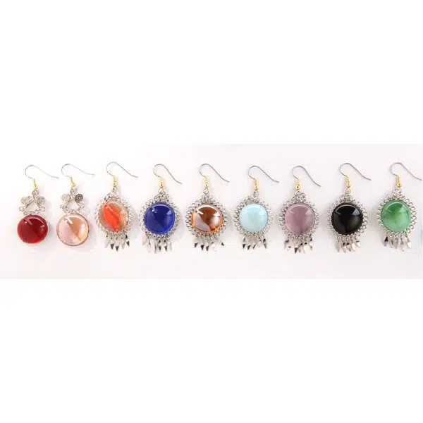 A picture of all the different colors that the gem earrings can come in, the colors are, red, peach, clear/pink, clear/orange, blue, clear/brown, bright blue, dark pink, black, and green.