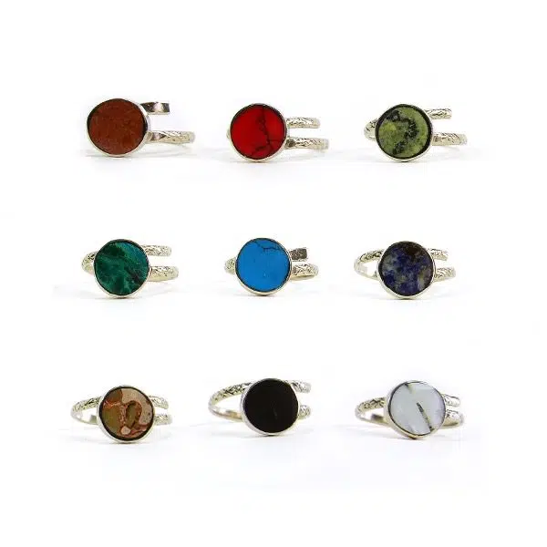 A picture of all the different colored semi precious stone that the stone labrado ring can have.