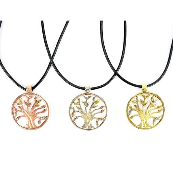 A picture of three vida necklaces, coming in three different kinds of metal, brass, copper, and alpaca silver.