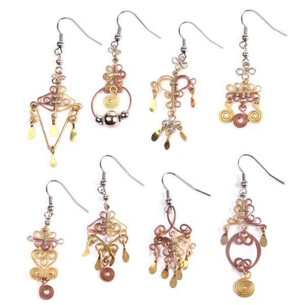 A picture of a large verity of mixed metal earrings, made out of copper, brass, and alpaca silver