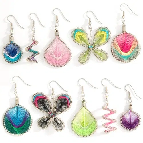 A picture of A large racquet earrings, they come in a bunch of bright colors.