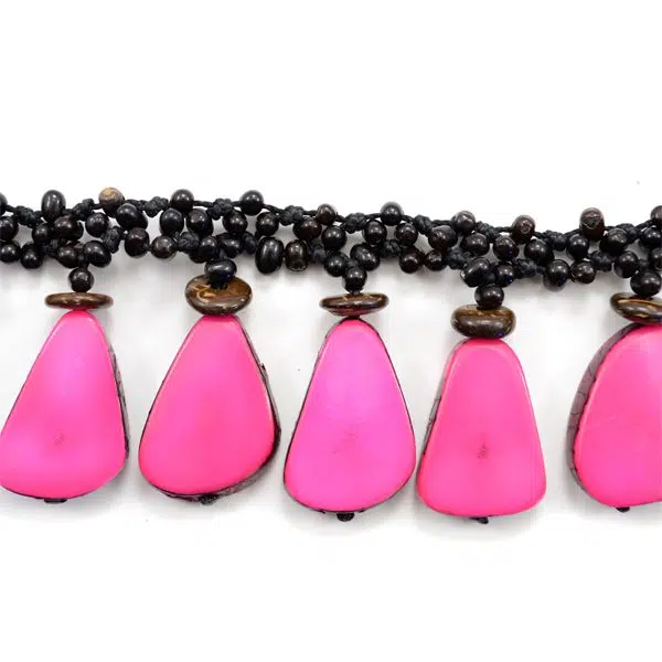A close up picture of the pink slices of tagua.