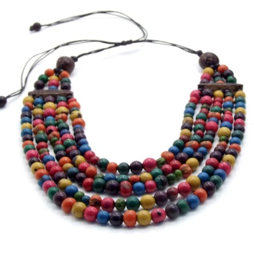A picture of the arcoiris set, achira beads strung together with coconut.